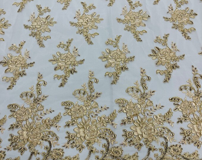 Metallic Gold flower lace corded and embroider with sequins on a mesh-Sold by the yard.