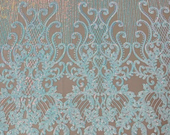 Aqua iridescent damask design on a Nude 4 way stretch mesh-prom-sold by the yard.