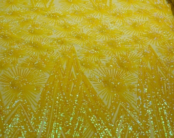 Yellow iridescent geometric Star sequin design on a 4 way stretch mesh-sold by the yard.