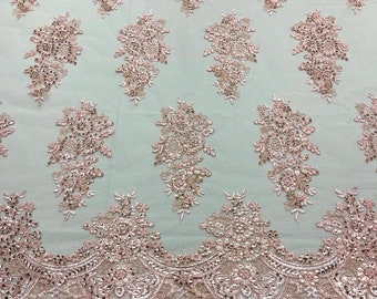 Pink Floral corded embroider with sequins on a mesh lace fabric-prom-sold by the yard.