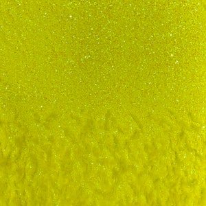Neon Yellow Iridescent 5mm sequins on a stretch velvet with feathers  2-way stretch, sold by the yard