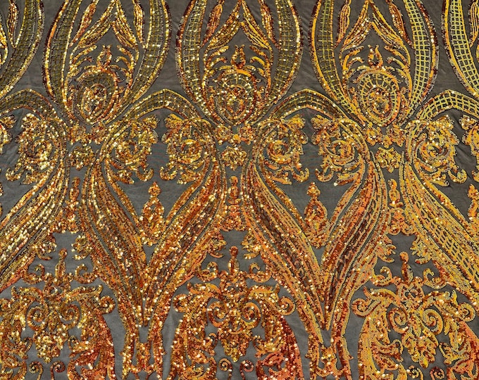 Orange/red iridescent empire damask design with sequins embroider on a Black 4 way stretch mesh fabric-sold by the yard.