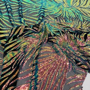 Neon Orange iridescent phoenix feather design with sequins embroider on a Orange 4 way stretch mesh fabric-sold by the yard. main image 1
