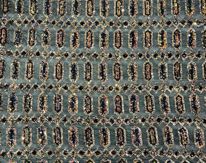 Jewel iridescent geometric sequin design on a black 4 way stretch mesh fabric-sold by the yard.