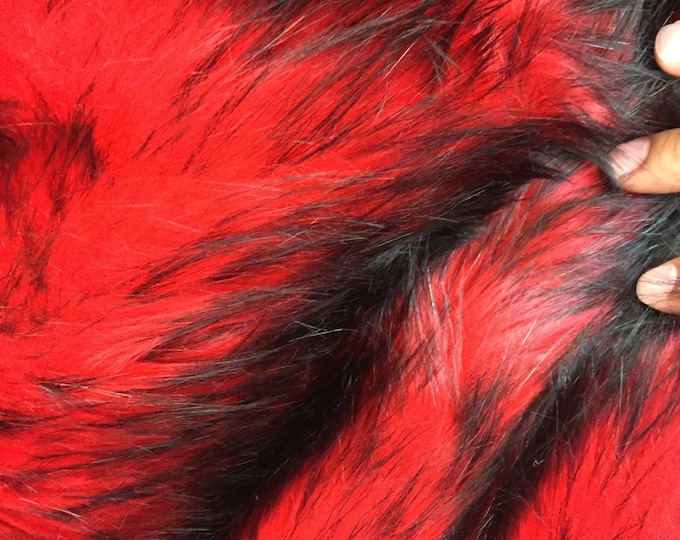 Red/black husky faux fur, 2 tone shaggy faux fur. Sold by the yard. 60" wide.