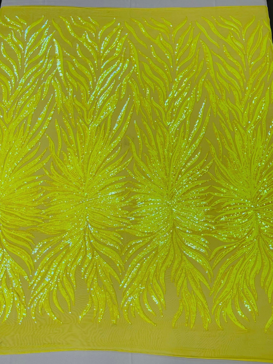 Neon Orange iridescent phoenix feather design with sequins embroider on a Orange 4 way stretch mesh fabric-sold by the yard. main image 0