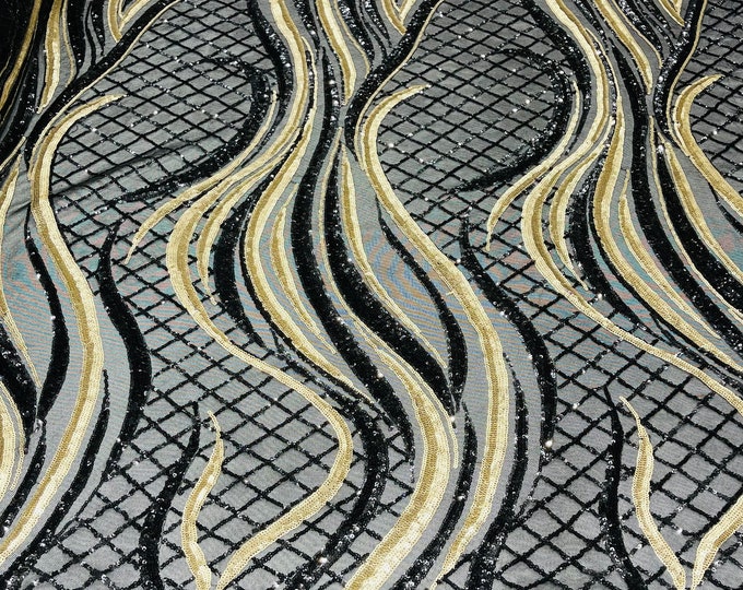 Black/Matte Gold sequin flame design on a 4 way stretch black mesh-sold by the yard.
