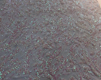 Pink iridescent sequins vine design embroidery on a white 4 way stretch mesh-dresses-fashion-apparel-prom-nightgown-sold by the yard.