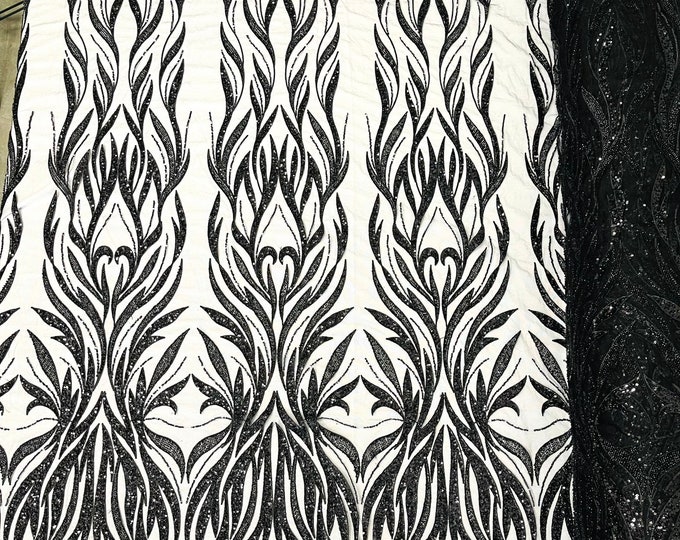 Black damask embroider and heavy beaded on a mesh lace fabric-sold by the yard-