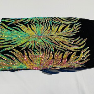 Orange iridescent phoenix feather design with sequins embroider on a Nude 4 way stretch mesh fabric-sold by the yard. main image 1