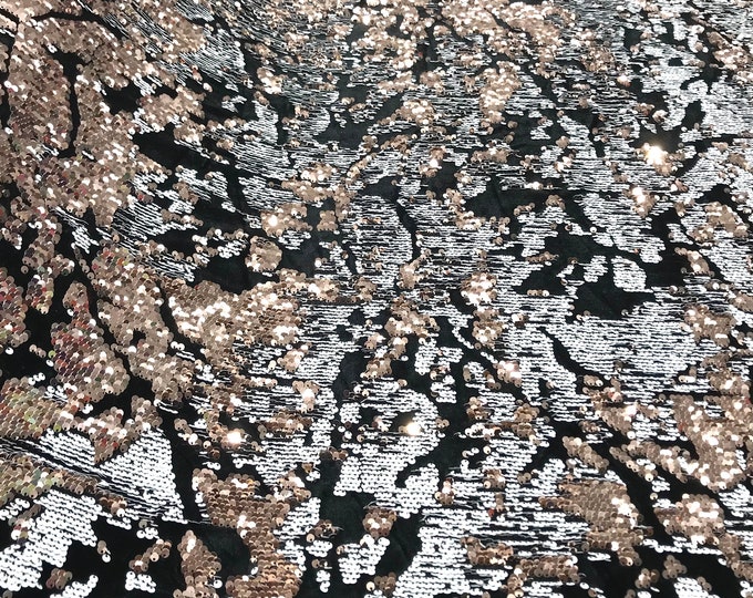 Rose Gold/ White sequins flip two tone camouflage  design on a black stretch velvet, Sold by the yard.