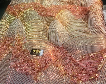 NEW!! Orange iridescent fringe sequins design on a 4 way stretch nude mesh fabric-prom-nightgown-sold by the yard-free shipping in the USA-