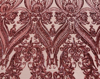 Dusty rose empire damask design with sequins embroider on a pink 4 way stretch mesh fabric-sold by the yard.