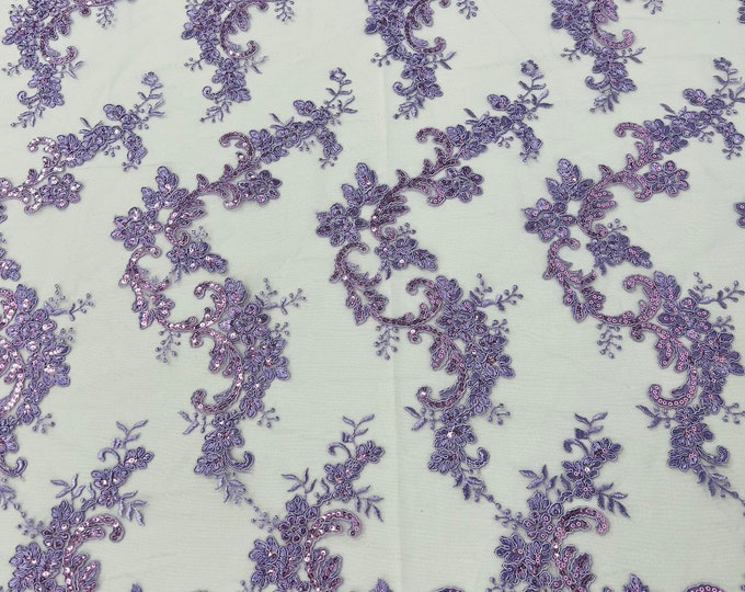 Lavender flower lace corded and embroider with sequins on a mesh-Sold by the yard.