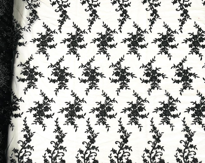 Black flower embroider with sequins and heavy beaded on a mesh lace fabric-sold by the yard.