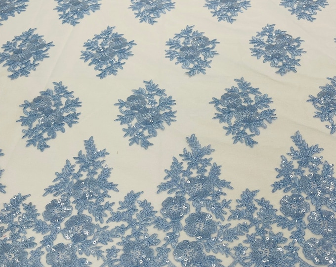 Light blue Floral corded embroider with sequins on a mesh lace fabric-sold by the yard.