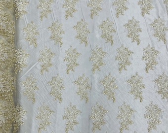 Ivory gold corded embroider flowers with sequins on a mesh lace fabric-prom-sold by the yard.