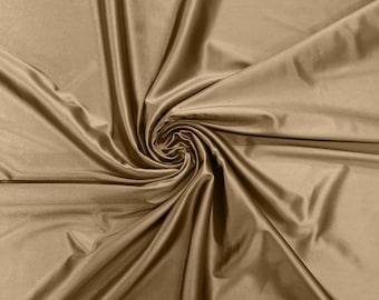 Light Gold Deluxe Shiny Polyester Spandex Fabric Stretch 58" Wide Sold by The Yard.