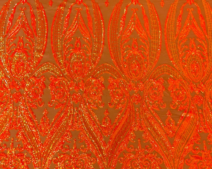 Orange iridescent empire damask design with sequins embroider on a 4 way stretch mesh fabric-sold by the yard.