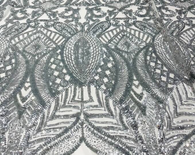 Silver royalty sequin design on a white 4 way stretch mesh-prom-sold by the yard.