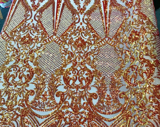 Orange princess design iridescent sequins embroidery on a 4 way stretch nude mesh-dresses-fashion-apparel-nightgown-prom-sold by the yard.