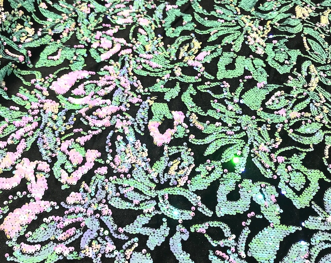 Mint, Pink iridescent sequins flip two tone floral design on a black stretch velvet, Sold by the yard.