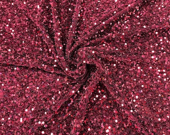 Burgundy economic all over shiny sequins on a 2 way stretch velvet , sold by the yard.