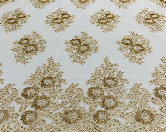 Gold Floral corded embroider with sequins on a mesh lace fabric-sold by the yard.