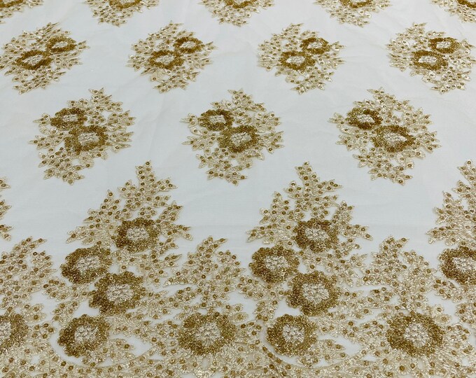 Gold Floral corded embroider with sequins on a mesh lace fabric-sold by the yard.