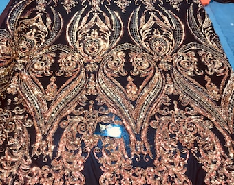Orange iridescent big damask sequin design on a black 4 way stretch mesh-prom-nightgown-sold by the yard-free shipping in the usa.