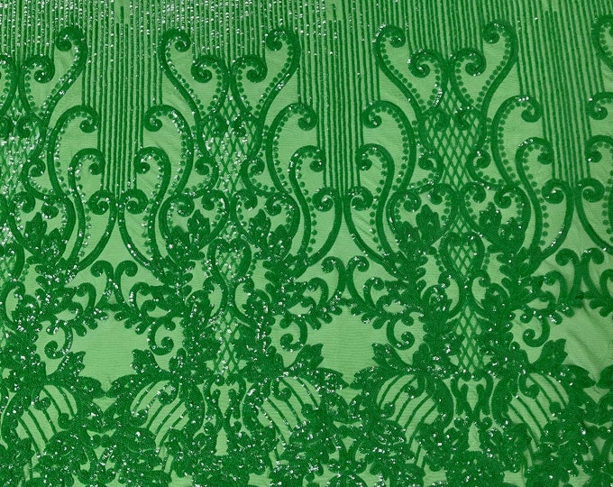Green damask design on a 4 way stretch mesh-prom-sold by the yard.