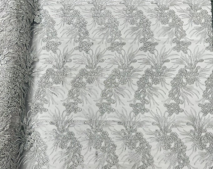 Silver/gray feather design lace with metallic cord and embroider with sequins on a mesh-Sold by the yard.