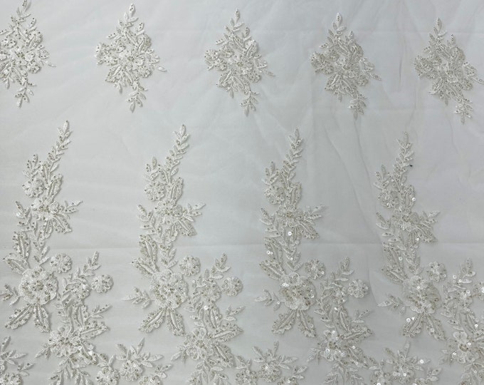 Ivory floral design embroider and beaded on a mesh lace fabric-Wedding/Bridal/Prom/Nightgown fabric.