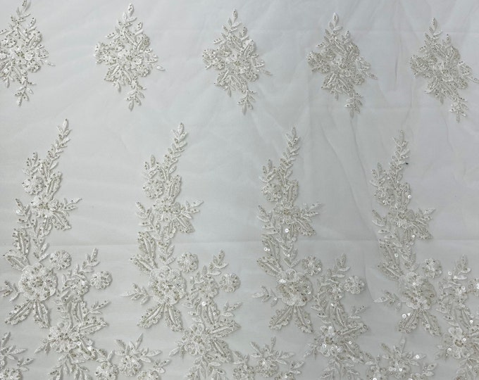 Ivory floral design embroider and beaded on a mesh lace fabric-Wedding/Bridal/Prom/Nightgown fabric.