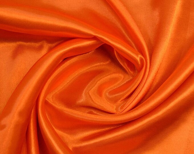 Orange Heavy Shiny Bridal Satin Fabric for Wedding Dress, 60" inches wide sold by The Yard.