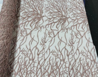 Blush pink Vine Design Embroider and heavy beading on a mesh lace-sold by the yard.