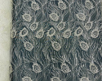 Off white metallic floral embroider and heavy beaded on a mesh lace fabric-sold by the yard-