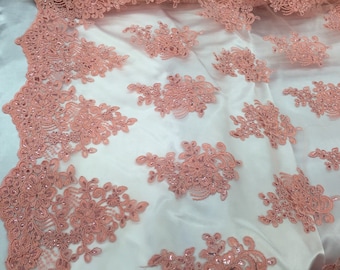 Coral flower lace corded and embroider with sequins on a mesh. Wedding/bridal/prom/nightgown fabric. Sold by the yard.