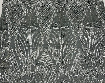 Silver geometric diamond design with shiny iridescent sequins on a black 4 way stretch mesh-dresses-prom-nightgown-sold by the yard-