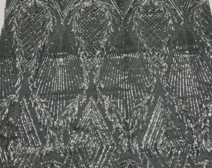 Silver geometric diamond design with shiny iridescent sequins on a black 4 way stretch mesh-dresses-prom-nightgown-sold by the yard-