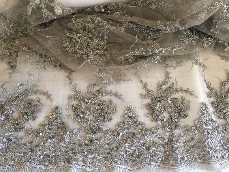 Gray marvy flower design embroider with glass beads and sequins on a mesh lace yd