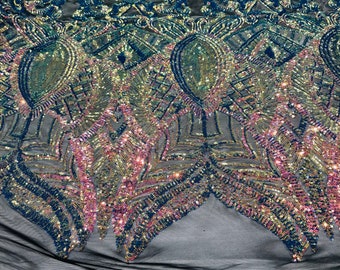 Rainbow iridescent royalty sequin design on a black 4 way stretch mesh-prom-sold by the yard.