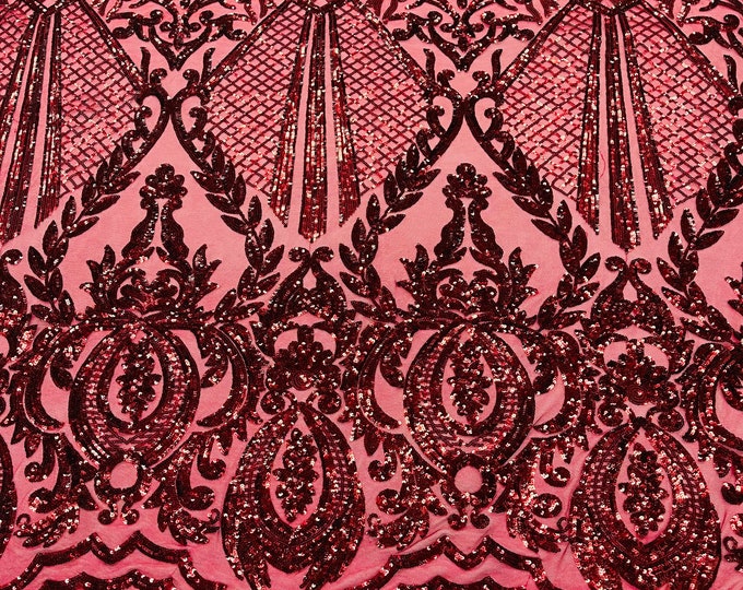 Burgundy shiny sequin damask design on a nude 4 way stretch mesh-sold by the yard.