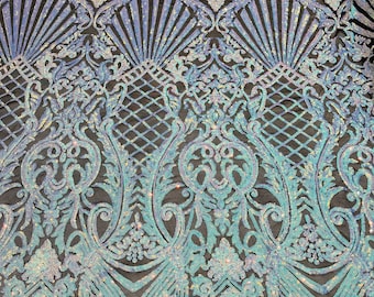 Aqua iridescent damask design on a black 4 way stretch mesh-prom-sold by the yard.