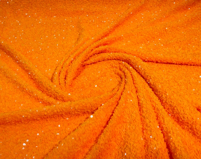 Bright Orange 5mm sequins on a light orange stretch velvet 2-way stretch, sold by the yard.