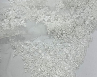 Ivory corded lace 3d floral embroider sold by the yard.