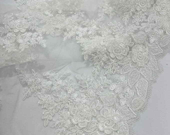 Ivory corded lace 3d floral embroider sold by the yard.