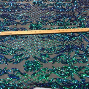 HUNTER GREEN SEQUINS DAMASK DESIGN EMBROIDERY ON A 4 WAY STRETCH MESH-BY YARD