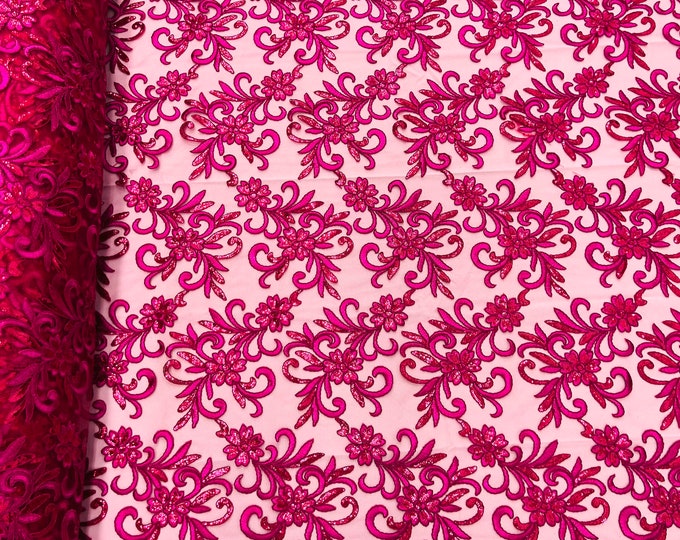 Fuchsia corded flowers embroider with sequins on a mesh lace fabric-sold by the yard-