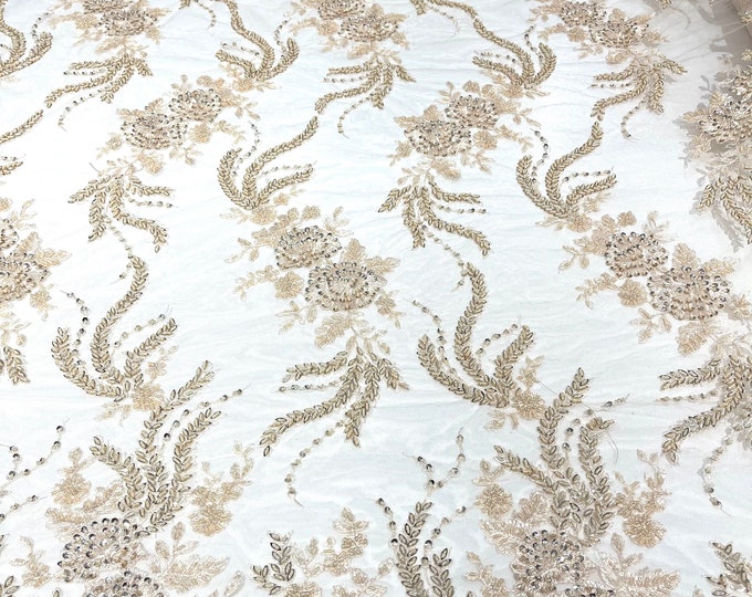 Blush Peach flowers embroider and heavy beaded on a mesh lace fabric-sold by the yard.